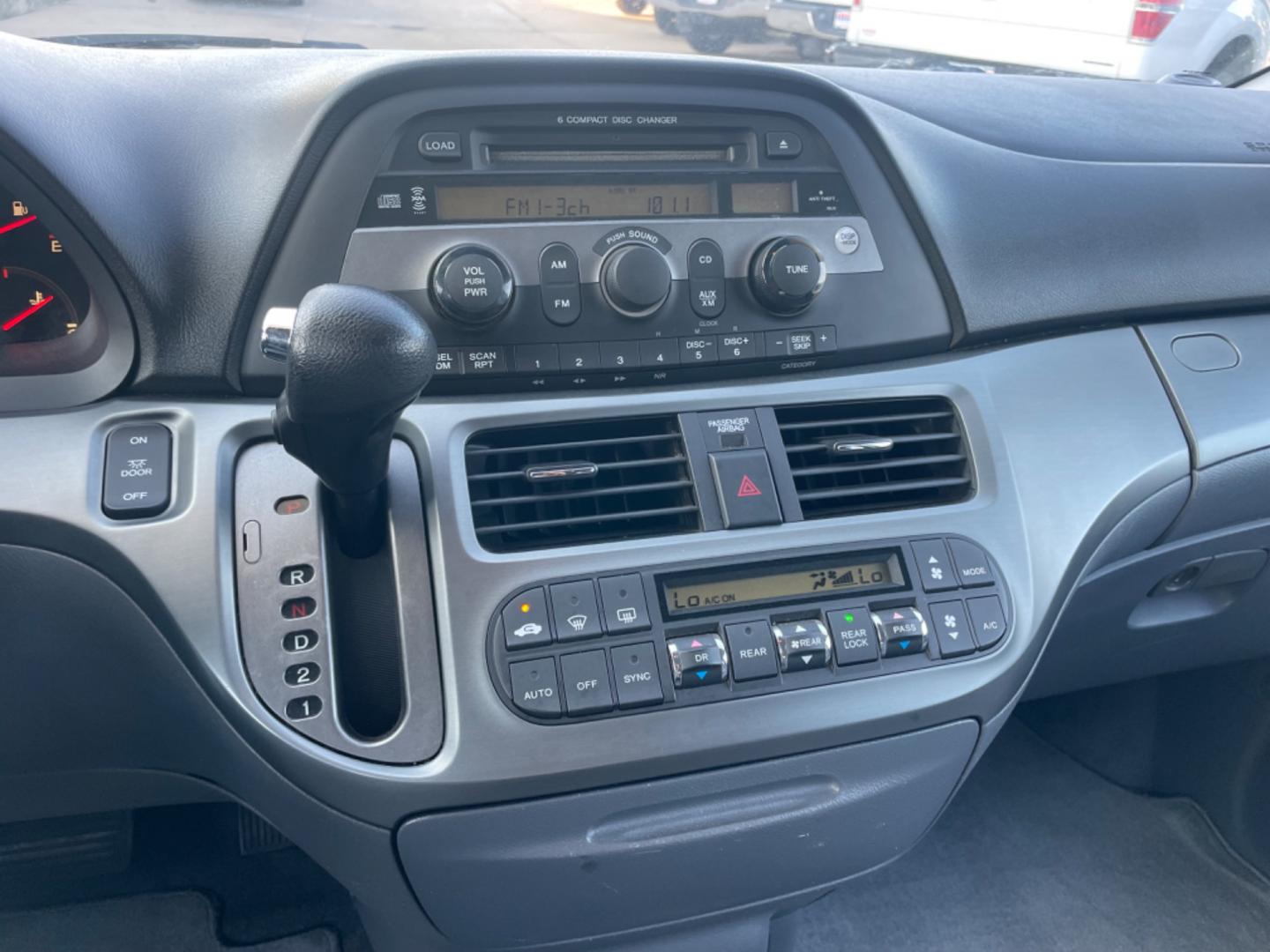 2007 Blue /Silver Honda Odyssey EX (5FNRL38457B) with an 3.5L V6 SOHC 24V engine, 5-Speed Automatic Overdrive transmission, located at 1501 West 15th St., Houston, 77008, (713) 869-2925, 29.797941, -95.411789 - Photo#13